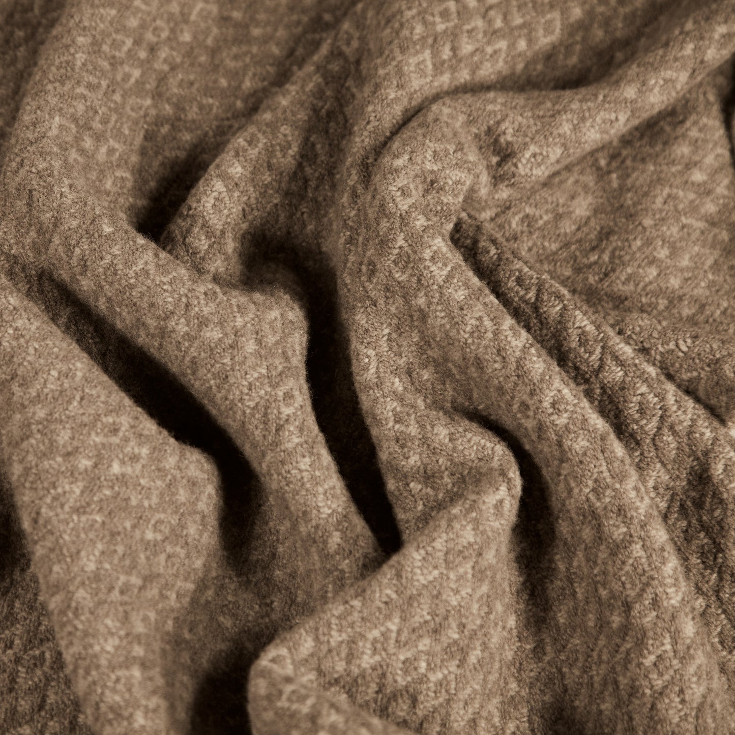 
                  
                    The Handwoven Wool Blanket
                  
                